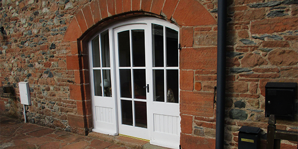 shaped single timber door with sidelights from ajd chapelhow